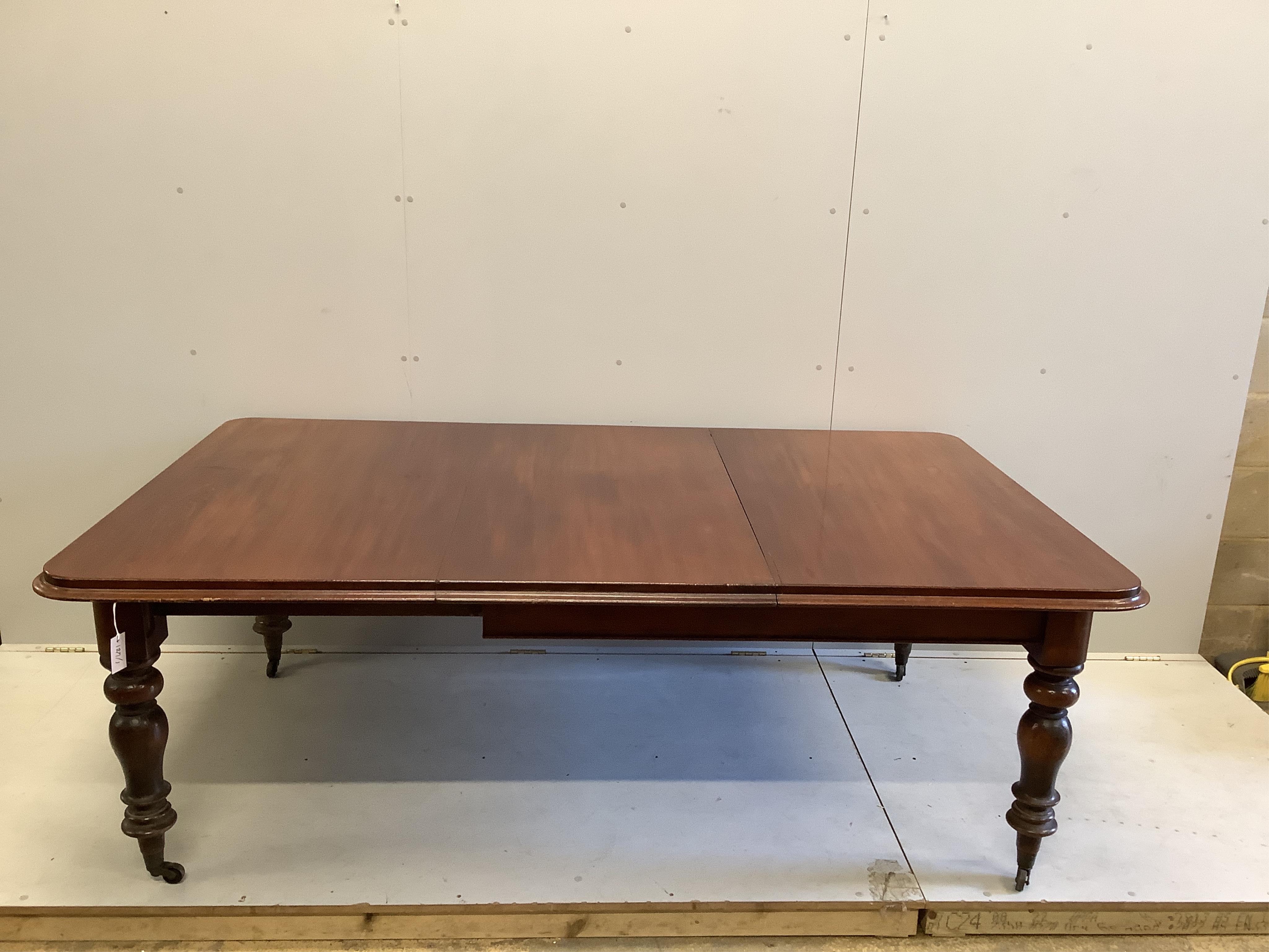 A Victorian mahogany rectangular extending dining table, width 209cm fully extended, depth 129cm, height 73cm